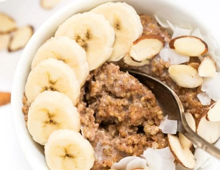 Healthy power breakfast bowls with quinoa and fresh toppings