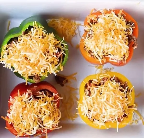 Colorful stuffed bell peppers filled with vegetables and spices